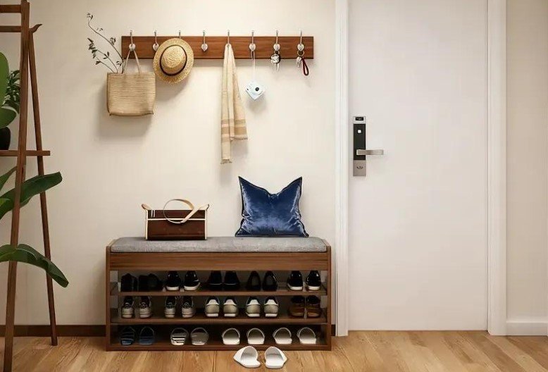Compact entryway with wall hooks and organized shoe storage